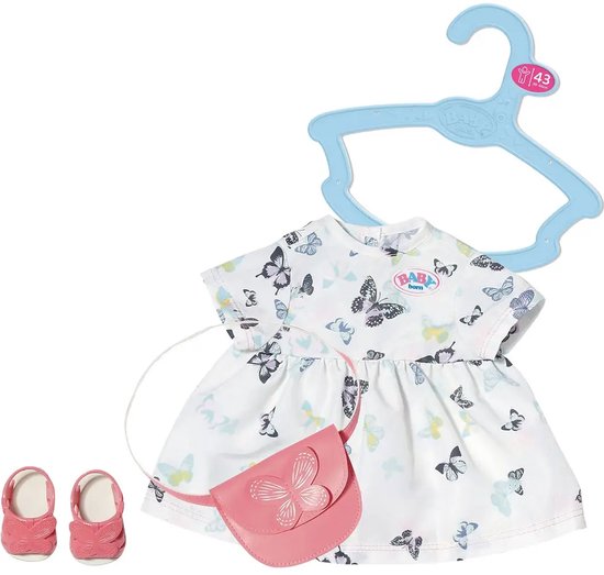 Witte jurk met vlinderprint, roze tasje en roze schoentjes. Inclusief hanger.