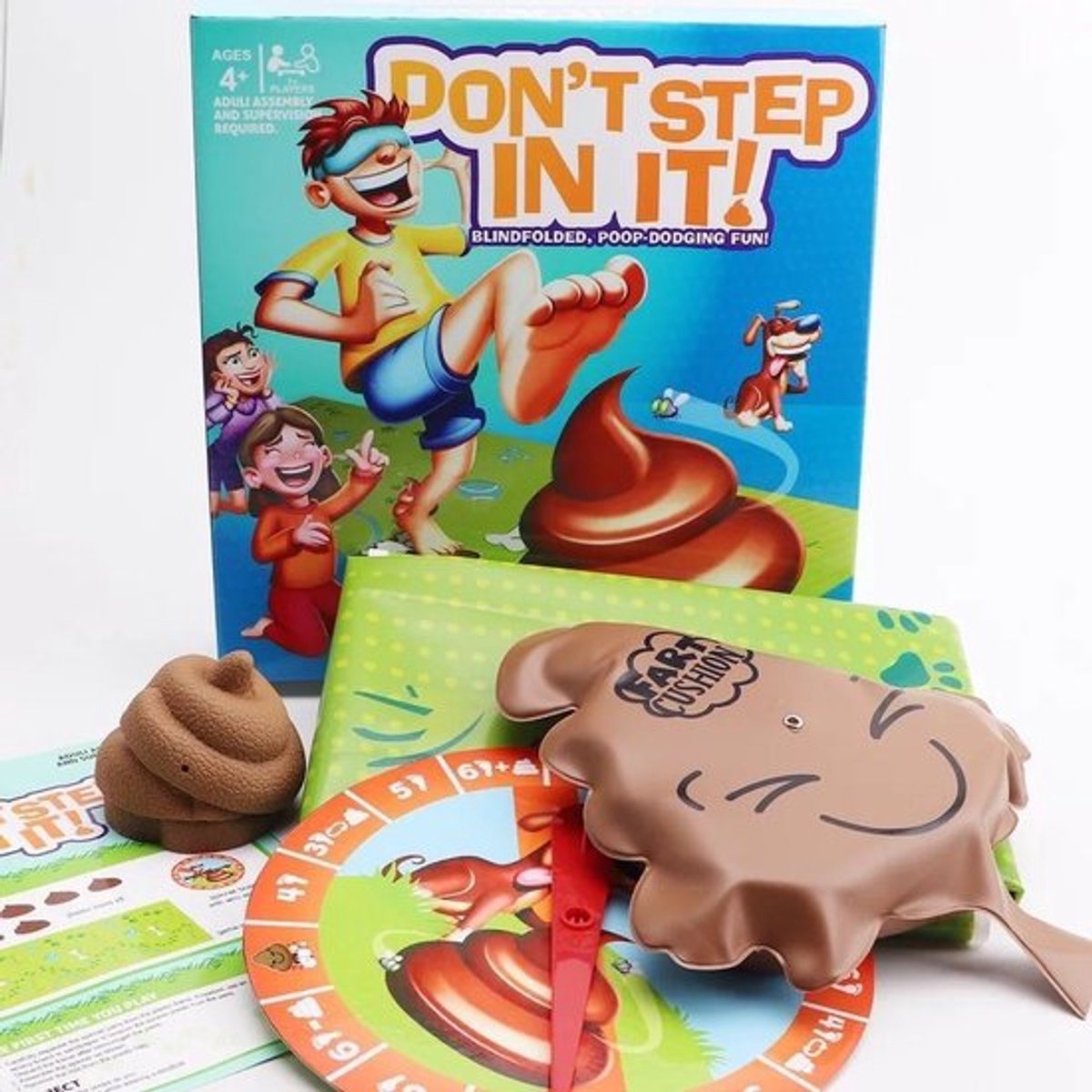 Don't step in it - vermijd de lachende kakjes - gezelschapsspel - voor het hele gezin - met blinddoek en spinner