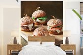 Behang - Fotobehang Vier schattige hamburgers op een snijplank - Breedte 190 cm x hoogte 260 cm