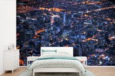 Behang - Fotobehang De hoofdstad van het Colombiaanse Bogota in de nacht - Breedte 600 cm x hoogte 400 cm