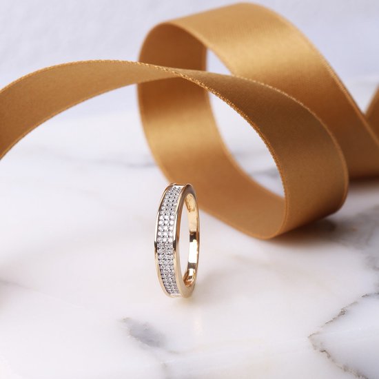 Bague en or jaune 14 kt avec diamant 0,20 ct