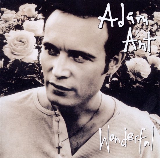 Adam Ant met rozen, tekst 'Adam Ant Wonderful'.