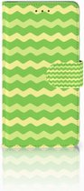 Bookcase Hoesje Geschikt voor Samsung J7 2016 Design Waves Green