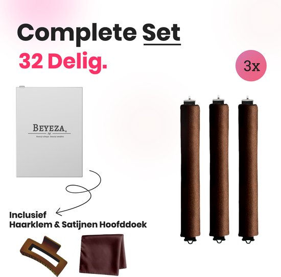 Drie bruine blowout rollers, een bruine haarklem en een gevouwen bruine satijnen doek. Tekst: Complete set 32 delig.