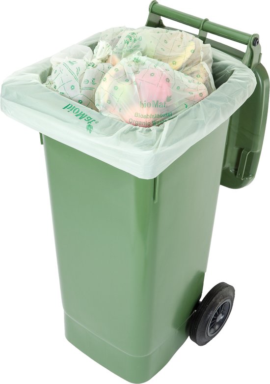 Groene vuilnisbak gevuld met afval, met een doorzichtige bioMat zak.
