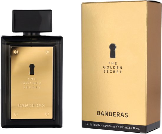 Zwarte parfumfles met goudkleurig label met sleutelgat en "THE GOLDEN SECRET" en "BANDERAS". Naast de doos met goudkleurige afwerking en hetzelfde label.
