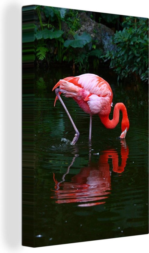 Canvas Schilderij Een roze flamingo aan eten - - Wanddecoratie | bol.com