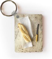 Sleutelhanger - Stokbrood op wit bakpapier - Uitdeelcadeautjes - Plastic