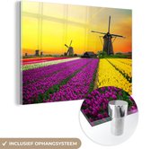 MuchoWow® Glasschilderij 150x100 cm - Schilderij acrylglas - Windmolen - Tulpen - Bloemen - Lente - Foto op glas - Schilderijen