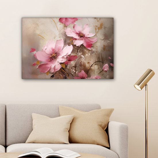 Abstract schilderij van roze bloemen met gouden accenten op een beige achtergrond.