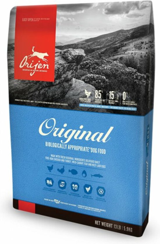 Orijen Original hondenvoer zak met rood bovenpaneel en berglandschap. Tekst 'Original'.