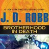 Boekomslag 'Brotherhood in Death' van J.D. Robb, met goudkleurige zegel en een blauwe olifant.