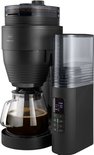 Zwart Melitta Aromafresh Glass X koffiezetapparaat met glazen kan en digitale display.