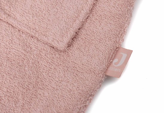Tissu éponge rose avec une étiquette Jollein.