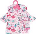 Roze badjas met capuchon en scheeps-, anker-, glijbaan- en vuurtorenmotieven in roze en blauw, hangend aan een roze hanger.