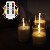 Drie grijze LED-kaarsen met realistische vlammen in glazen cilinders, met afstandsbediening in de hoek.