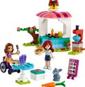 Ensemble de jeu LEGO Friends avec deux mini-poupées, un stand de crêpes, un lapin et une carotte.