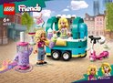 Doos met LEGO Friends mobiele bubbelthee stand: twee poppen, een mintgroene en gele foodtruck, een paarse bubbelthee-automaat en een roze scooter.