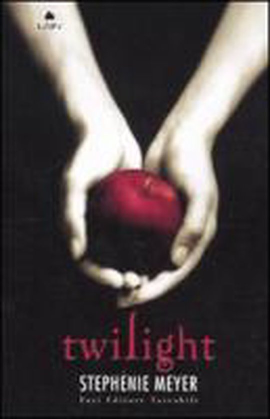 Deux mains tiennent une pomme rouge, avec le titre 'twilight' de Stephenie Meyer.
