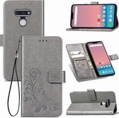 Voor LG Style3 L-41A vierbladige sluiting reliëf gesp mobiele telefoon bescherming lederen tas met lanyard & kaartsleuf & portemonnee & beugel functie (grijs)