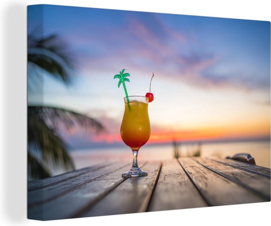 Canvas Schilderij Cocktail tijdens zonsondergang op het strand - 120x80 cm - Wanddecoratie
