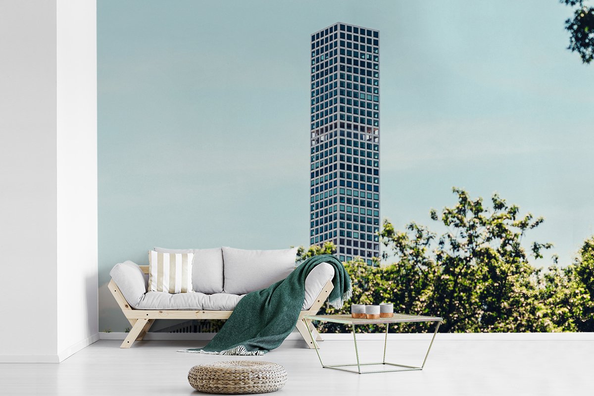 Behang - Fotobehang Toren - New York - Architectuur - Bladeren - Breedte 390 cm x hoogte 260 cm