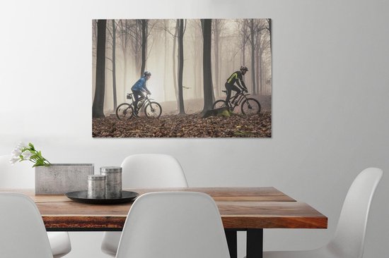 En VTT sur un chemin forestier 90x60 cm - Tirage photo sur toile (Décoration murale salon / chambre)