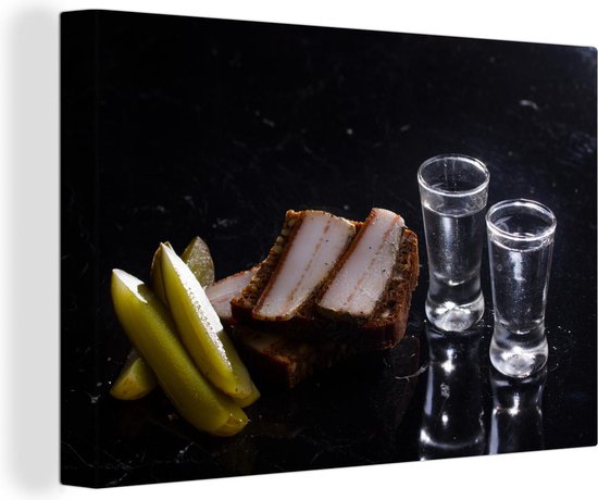 Canvas Schilderij Twee glaasjes Wodka op een zwarte achtergrond - 120x80 cm - Wanddecoratie - MuchoWow