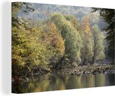 Canvas schilderij 150x100 cm - Wanddecoratie Reflectie van de mooie herfst gekleurde bossen in het Nationaal park Risnjak - Muurdecoratie woonkamer - Slaapkamer decoratie - Kamer accessoires - Schilderijen