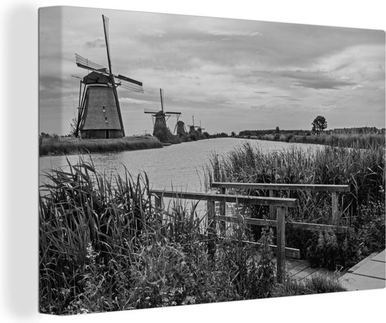 Photo Zwart et blanc des moulins à vent de Kinderdijk aux Nederland Toile 180x120 cm - Tirage photo sur toile (Décoration murale salon / chambre) XXL / Groot format!