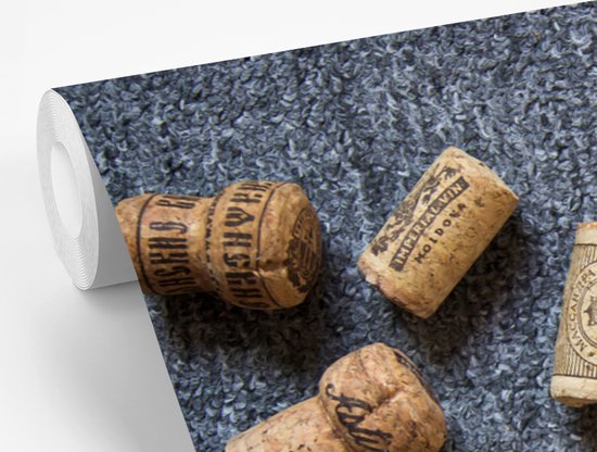 Quelques bouchons sur fond gris fond d' fotobehang