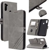 Voor Samsung Galaxy A11 Stiksels Stijl 2-Kleur Koe Textuur Horizontale Flip PU Lederen Case met Houder & Kaartsleuf & Lanyard (Grijs)