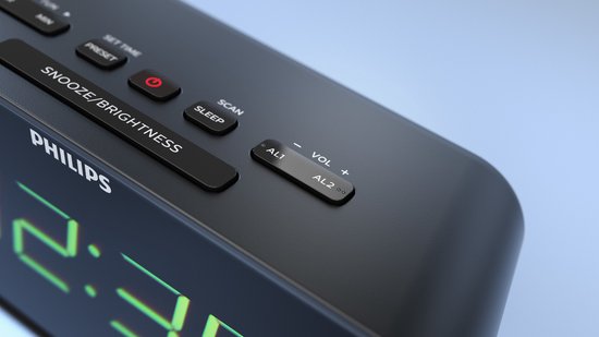 Close-up van de knoppen op de zwarte Philips wekkerradio.