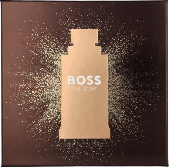 Bruine geschenkdoos met een glinsterend parfumflesje-silhouet en de tekst "BOSS THE SCENT".
