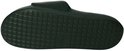 Donkergroene slipper, zijaanzicht, met geribbelde zool.