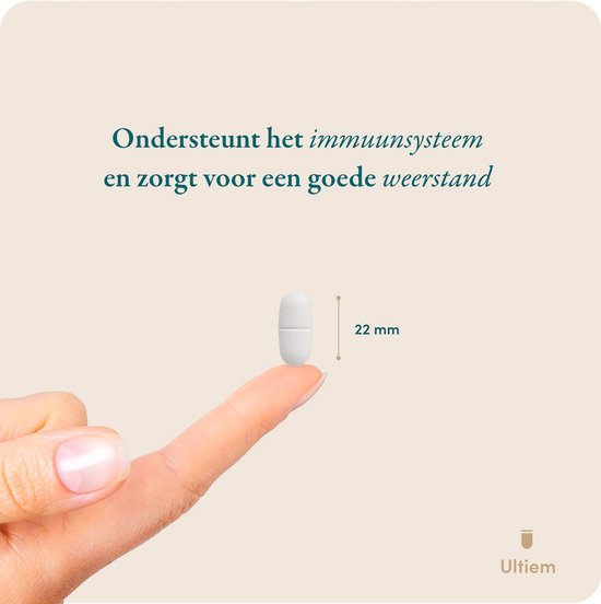 Een vinger met een magnesiumtablet van 22 mm.