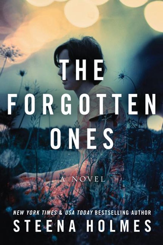 Boekcover met de titel 'The Forgotten Ones' van Steena Holmes. Een vrouw zit in een veld.
