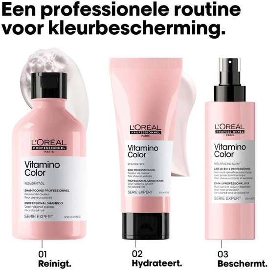 Drie L'Oréal Professionnel Vitamino Color producten: shampoo, conditioner en leave-in spray, alle in roze verpakking met zwarte accenten.