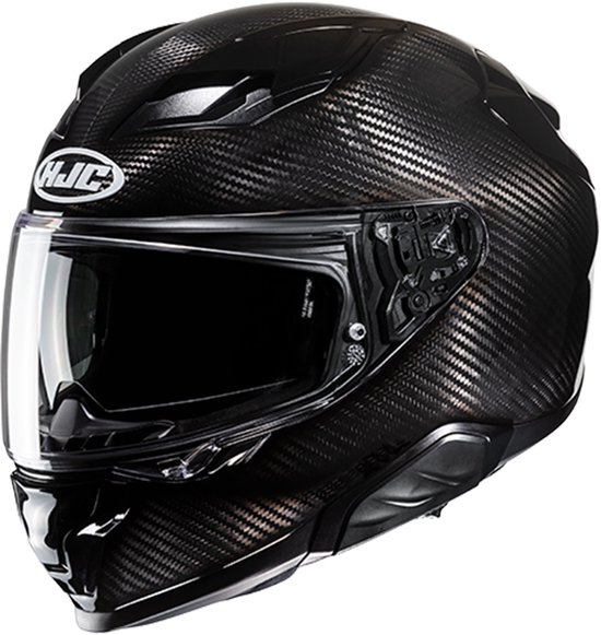 Zwarte HJC integraalhelm met carbonlook, helder vizier en ventilatieopeningen.