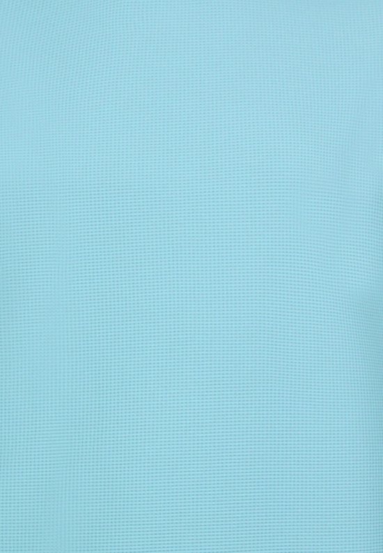Close-up van turquoise stof met wafelpatroon.