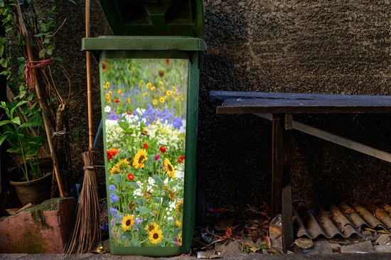 Groene kliko met een afbeelding van zonnebloemen, klaprozen en blauwe bloemen.