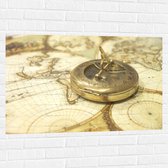 Muursticker - Gouden Kompas op Wereldkaart - 105x70 cm Foto op Muursticker