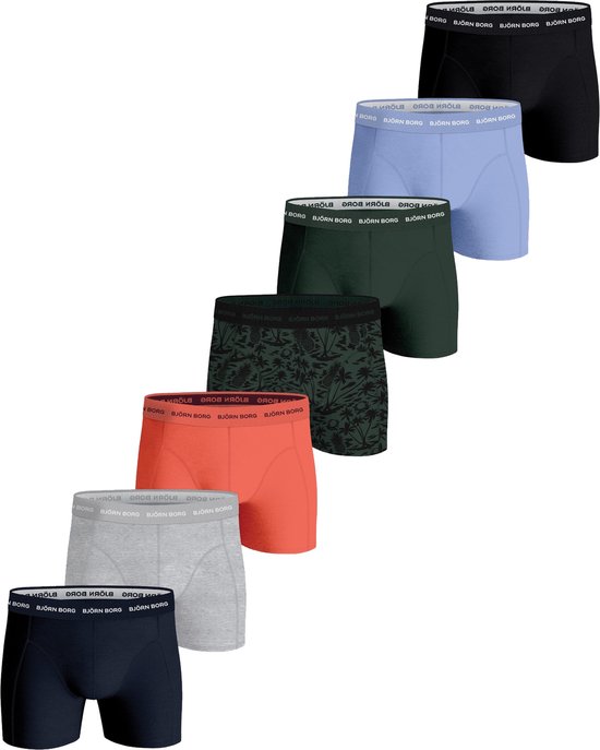 Sept caleçons Björn Borg de différentes couleurs et motifs : noir, bleu clair, vert foncé, vert à imprimé palmier, orange, gris et bleu marine.