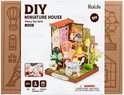 Doos van Robotime Rolife Fancy Tea Yard knutselkit met een miniatuur huisje.