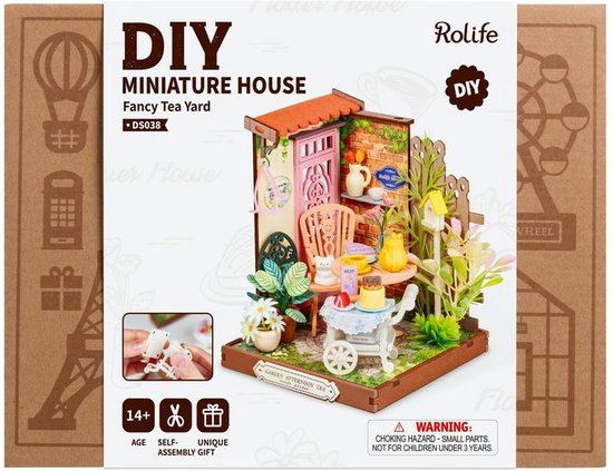 Doos van Robotime Rolife Fancy Tea Yard knutselkit met een miniatuur huisje.