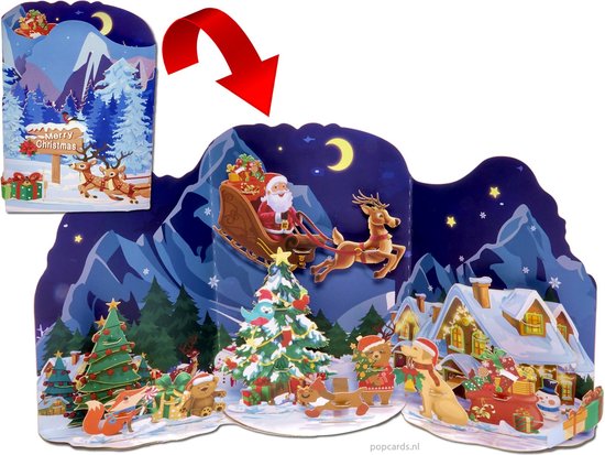 Popcards pop-up kaart – Zeer bijzondere Kerstkaart Uitklapbaar Drieluik met 3 uitgebreide kerst tafereeltjes: kerstbomen, talloze dieren, huisjes, cadeautjes, een dennenbos, kerstmannen… te veel om op te noemen.