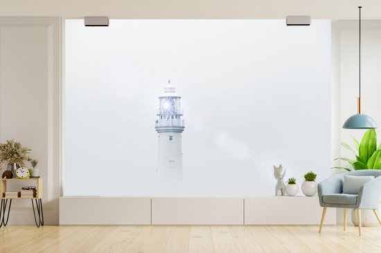 Behang - Fotobehang Vuurtoren in de mist - Breedte 600 cm x hoogte 400 cm