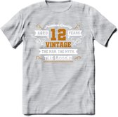 12 Jaar Legend T-Shirt | Goud - Wit | Grappig Verjaardag en Feest Cadeau Shirt | Dames - Heren - Unisex | Tshirt Kleding Kado | - Licht Grijs - Gemaleerd - XXL