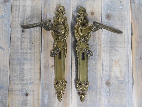 Deurklink op geveerd rozet Padania/Vivo messing antiek brons | Online Deurbeslagshop Deurklink op geveerd rozet Padania/Vivo messing antiek brons | Online Deurbeslagshop