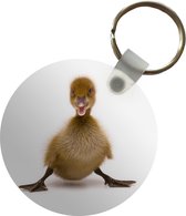 Porte-clés - Bébé canard posant - Plastique - Rond